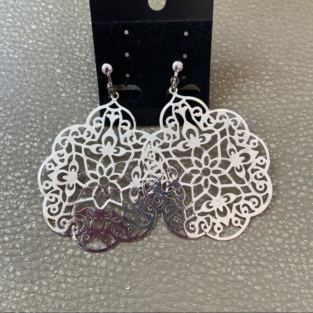 Silver cut out design fashion clip on earrings
